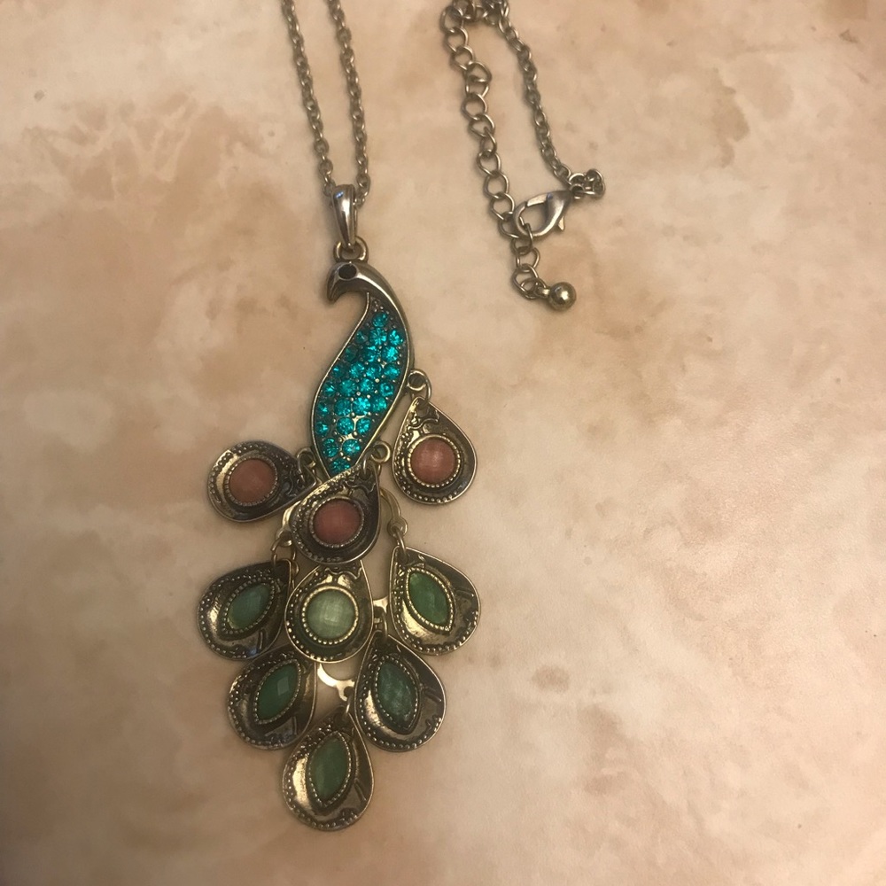Beautiful peacock necklace with earrings. Antique style